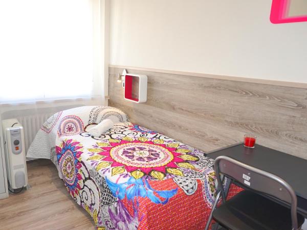 MuchoMadrid : photo 4 de la chambre  lit dans dortoir mixte de 2 lits avec salle de bains commune