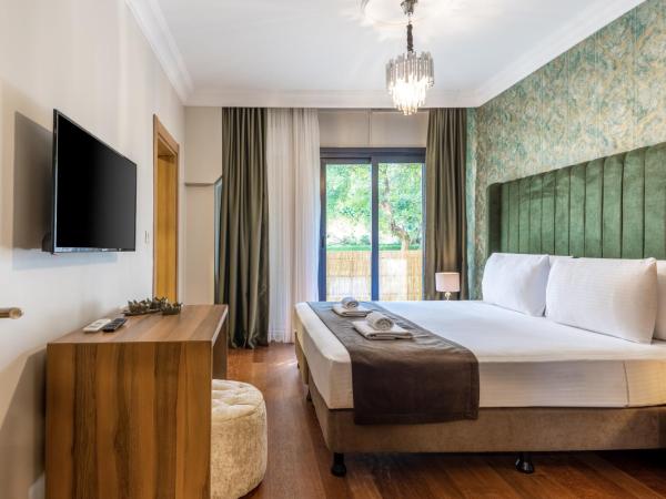 BayMari Suites Plus Florya : photo 2 de la chambre appartement 2 chambres deluxe - vue sur jardin