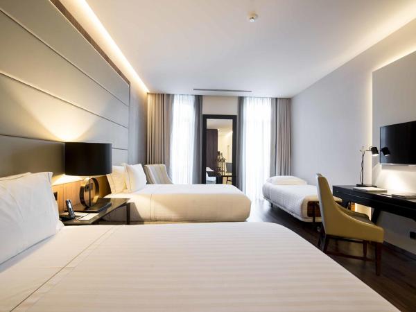 BessaHotel Liberdade : photo 3 de la chambre chambre double ou lits jumeaux avec lit d'appoint