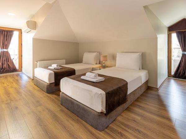 BayMari Suites Plus Florya : photo 9 de la chambre appartement 3 chambres de luxe avec terrasse - vue sur piscine