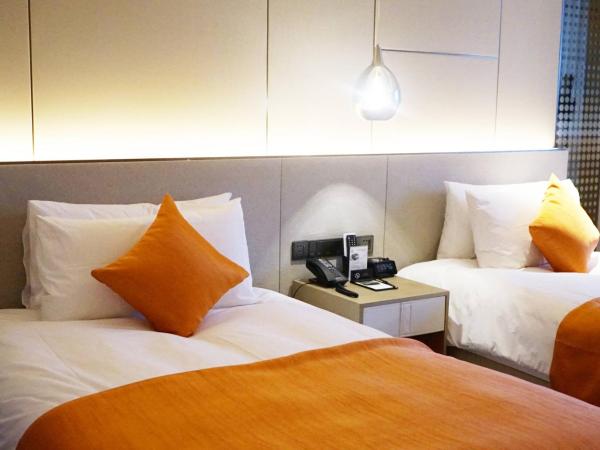 The QUBE Hotel Ningbo North : photo 1 de la chambre chambre lits jumeaux