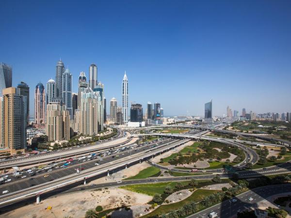Pullman Dubai Jumeirah Lakes Towers : photo 10 de la chambre chambre lit king-size exécutive deluxe