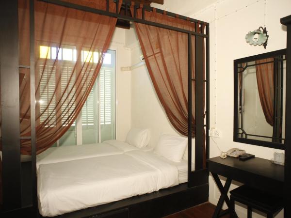99 Oldtown Boutique Guesthouse SHA EXTRA PLUS : photo 9 de la chambre chambre lits jumeaux standard avec balcon