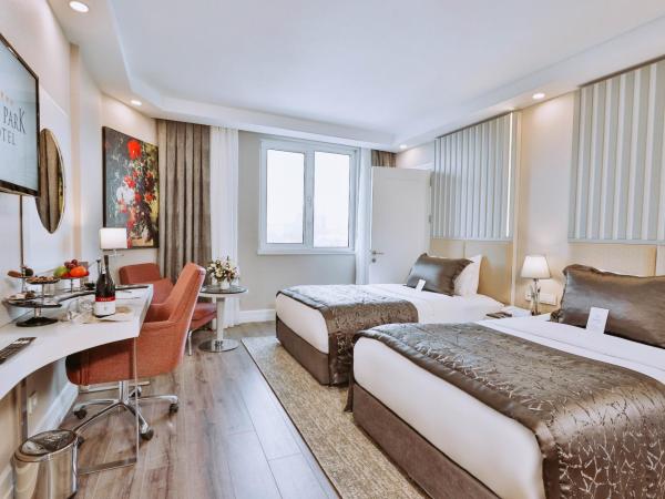 New Park Hotel : photo 7 de la chambre chambre quadruple deluxe