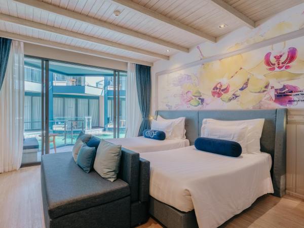 Hotel Tide Phuket Beach Front : photo 2 de la chambre chambre lits jumeaux - vue sur piscine