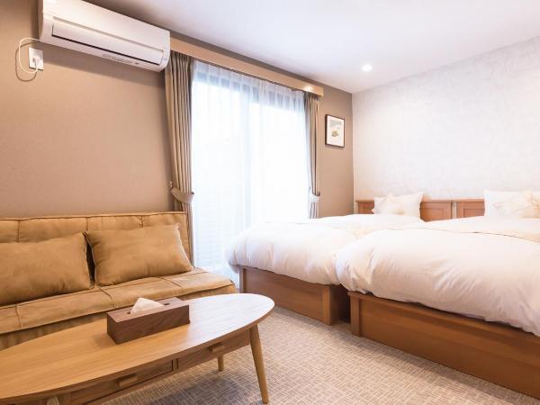 Stay SAKURA Kyoto Nijo Seasons : photo 2 de la chambre studio avec canapé-lit