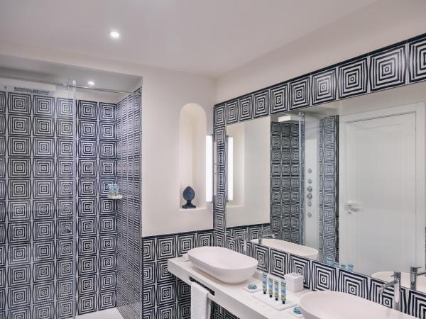 Pazziella Garden & Suites : photo 7 de la chambre suite avec piscine