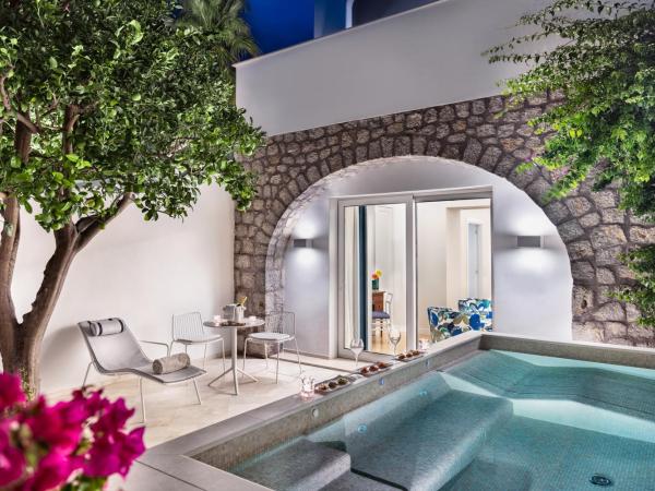 Pazziella Garden & Suites : photo 1 de la chambre suite avec piscine