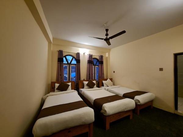 Dharma Backpackers : photo 3 de la chambre chambre triple standard