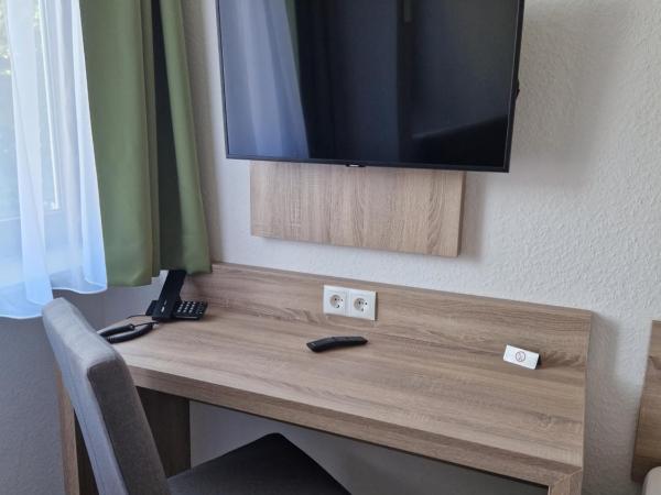 Hotel Ladage : photo 3 de la chambre chambre simple avec salle de bains