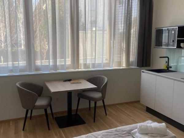 LOOMZ living Self-check-in : photo 1 de la chambre appartement avec lit queen-size