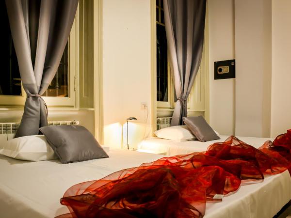 Hotel RossoVino Milano : photo 1 de la chambre chambre triple avec salle de bains privative