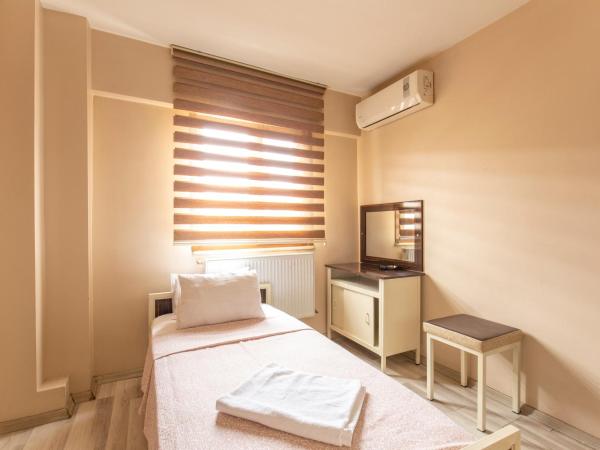 Beyoglu Huzur Hotel : photo 2 de la chambre chambre simple avec salle de bains privative