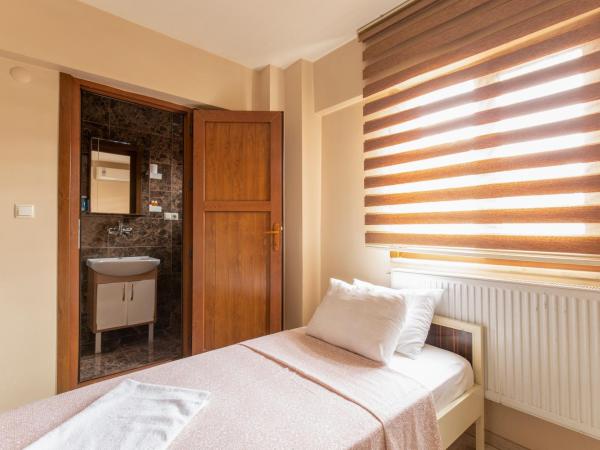 Beyoglu Huzur Hotel : photo 4 de la chambre chambre simple avec salle de bains privative