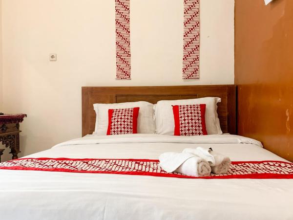 Grha Vege Jawi Syariah Mitra RedDoorz : photo 3 de la chambre chambre double standard