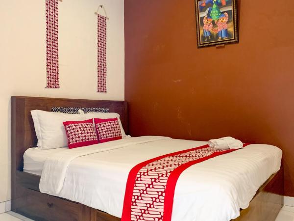 Grha Vege Jawi Syariah Mitra RedDoorz : photo 1 de la chambre chambre double standard