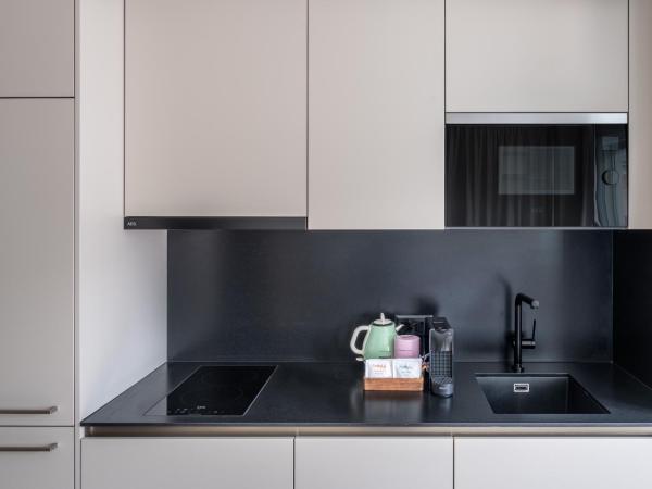 numa I Craft Apartments : photo 4 de la chambre medium studio with kitchen and balcony