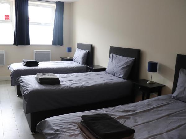 Dockside Lodge : photo 2 de la chambre chambre triple standard