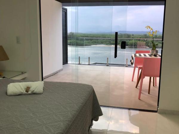 Suítes Luxo Marambaia- Epic House : photo 8 de la chambre chambre triple - vue sur mer