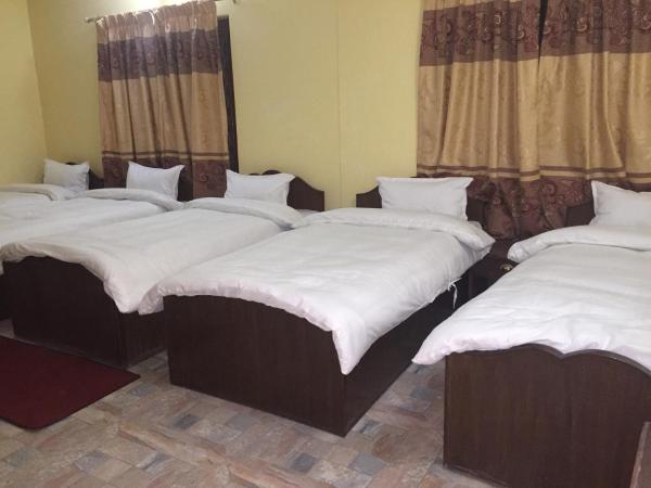 Hello Inn Guest House & Apartment : photo 1 de la chambre lit dans dortoir pour hommes de 4 lits