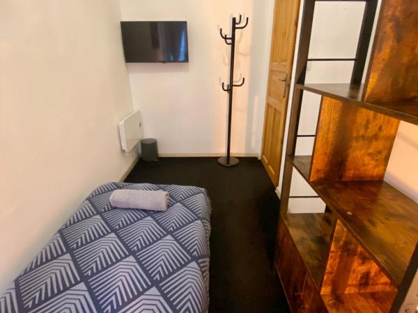 Topolove Rooms & Apartments : photo 4 de la chambre petite chambre simple