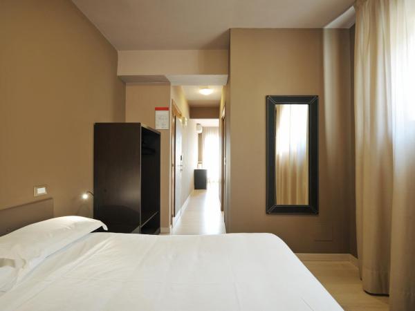 M14 Hotel & Spa : photo 1 de la chambre chambre triple