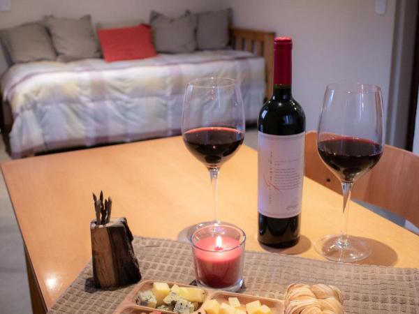 Paraiso Patagónico Bungalows and Apart Hotel : photo 9 de la chambre appartement avec vue sur la montagne