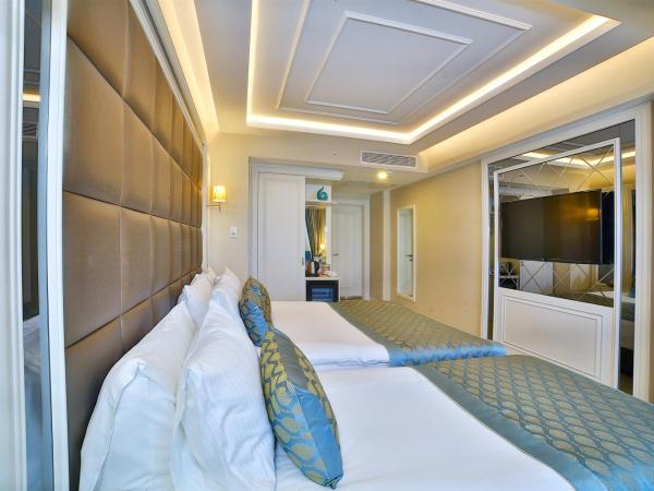 Büke Hotel Şişli : photo 4 de la chambre chambre familiale deluxe