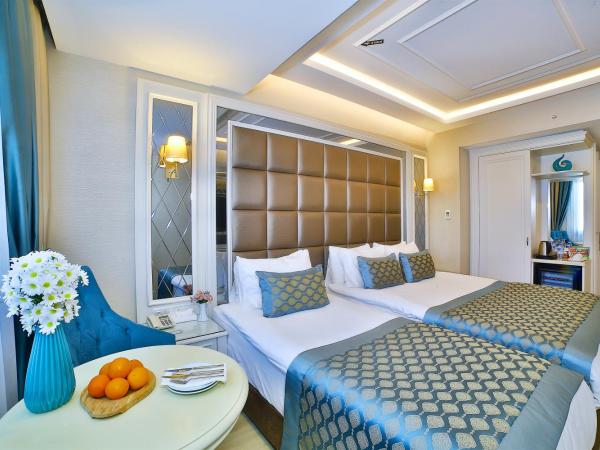 Büke Hotel Şişli : photo 1 de la chambre chambre familiale deluxe