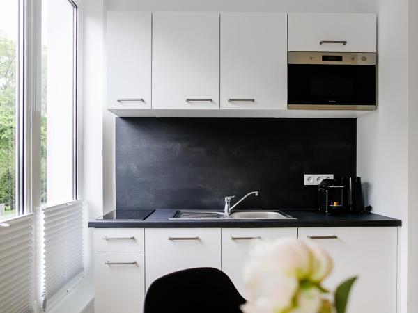 Louis & Louise Apartments & Lofts Am Wall I Digital Check In : photo 4 de la chambre studio lit king-size deluxe