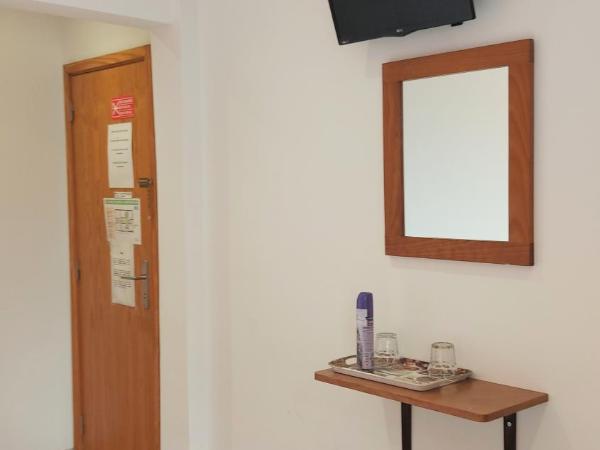 Residencial Condado : photo 2 de la chambre chambre lits jumeaux