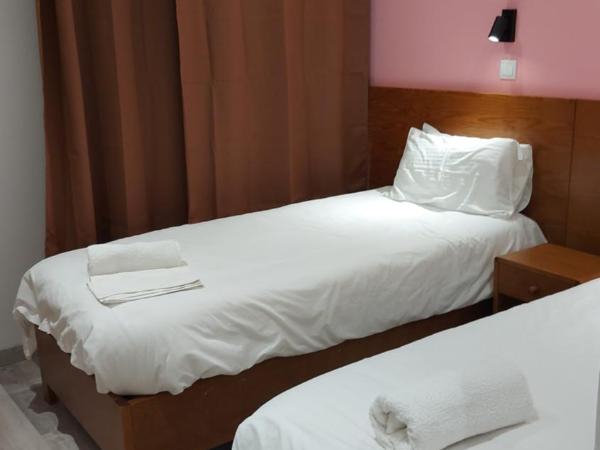 Residencial Condado : photo 4 de la chambre chambre lits jumeaux