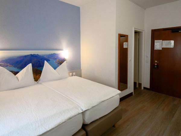 Acquarello Swiss Quality Hotel : photo 4 de la chambre chambre lits jumeaux confort