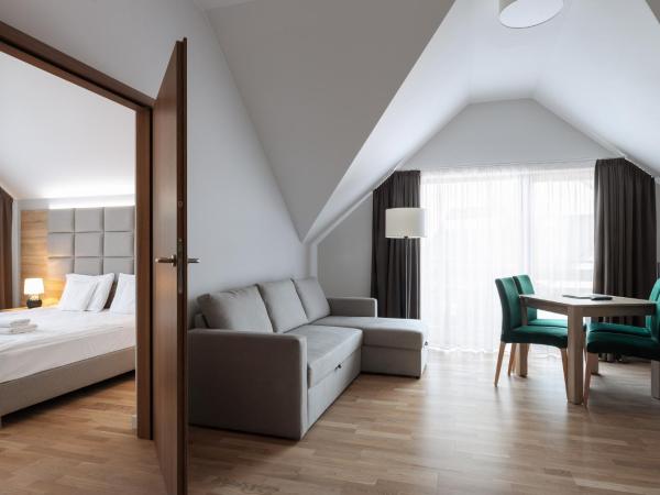 Green Apartments : photo 2 de la chambre appartement avec sauna