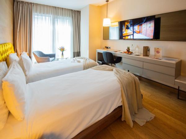 Dosso Dossi Hotels & Spa Downtown : photo 8 de la chambre chambre lits jumeaux exécutive