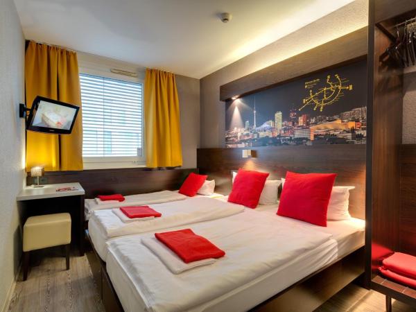 MEININGER Hotel Berlin Hauptbahnhof : photo 1 de la chambre chambre triple