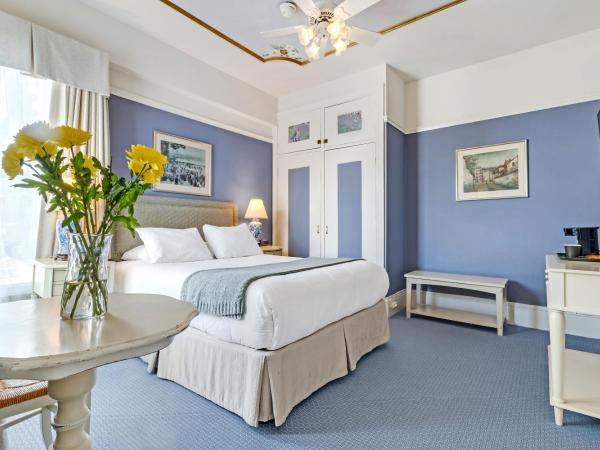 Cornell Hotel de France : photo 1 de la chambre chambre lit queen-size deluxe