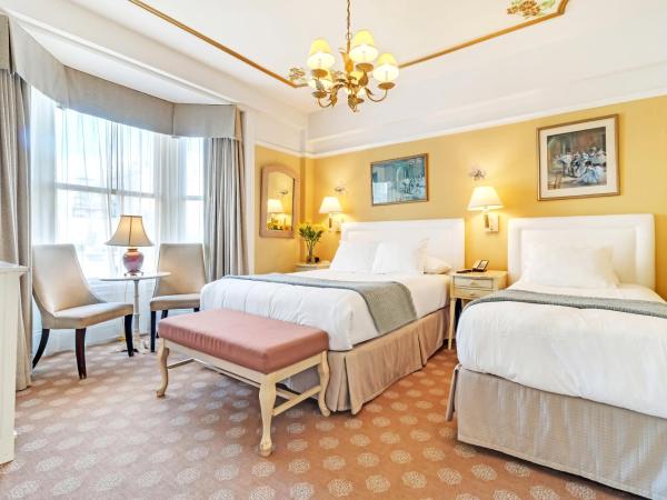 Cornell Hotel de France : photo 1 de la chambre chambre triple premier