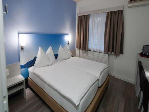 Acquarello Swiss Quality Hotel : photo 1 de la chambre chambre lits jumeaux confort