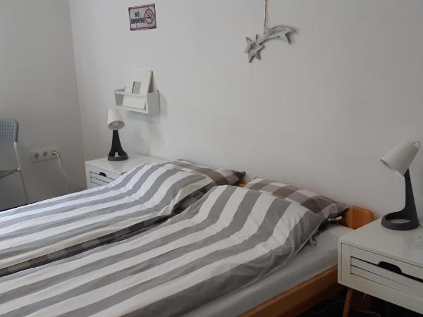 Master Corner Apartment : photo 5 de la chambre chambre double - vue sur jardin