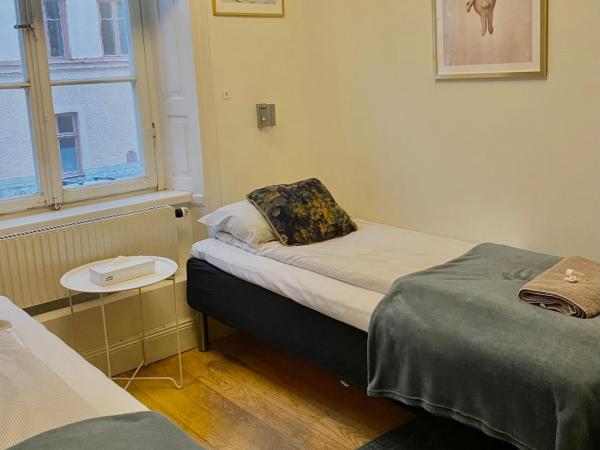 Lilla Brunn : photo 9 de la chambre chambre quadruple avec salle de bains commune