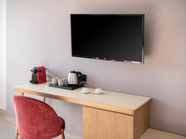 M City Hotel : photo 5 de la chambre suite familiale