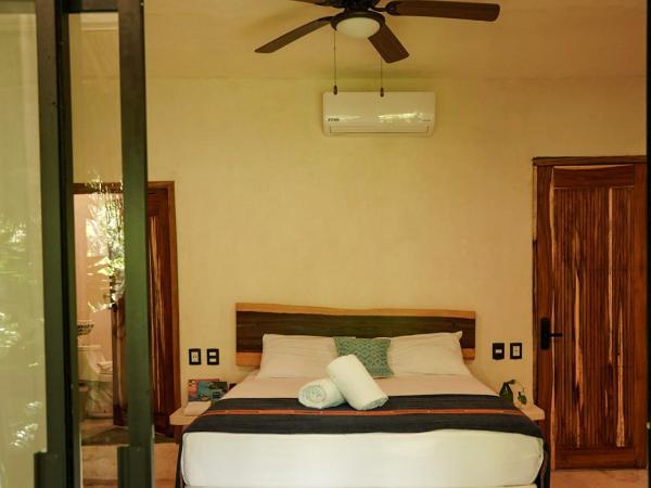 Corazon De Jade Tulum : photo 2 de la chambre room with one double bed with garden view balcony and private bathroom
