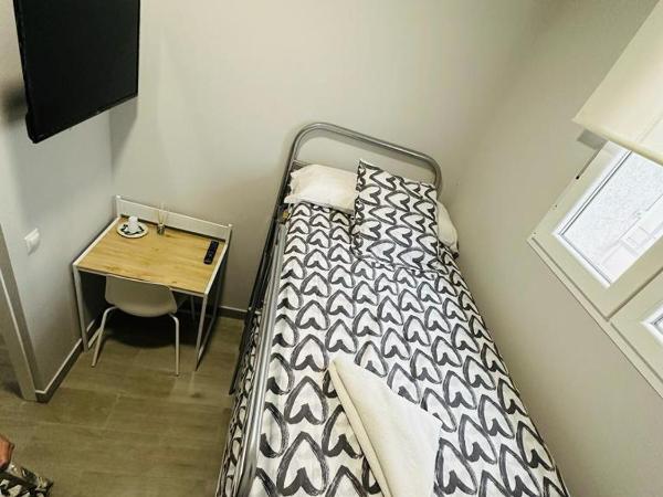 HOSPEDAJE CUATRO VIENTOS : photo 4 de la chambre chambre avec lits superposés et salle de bains commune