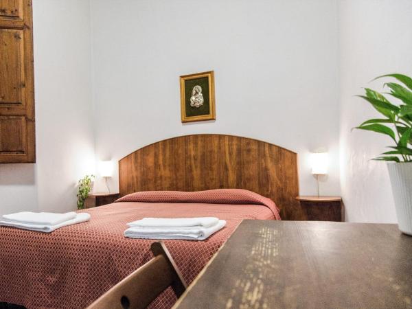 Casa Santo Nome di Gesu : photo 2 de la chambre chambre simple avec salle de bains extérieure privative