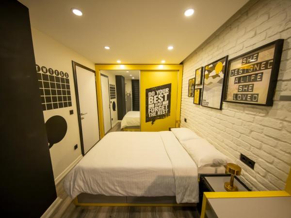 Ava Boutique Comfort Suites and Apartments : photo 8 de la chambre chambre lit queen-size deluxe