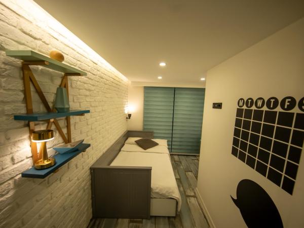 Ava Boutique Comfort Suites and Apartments : photo 4 de la chambre suite en duplex
