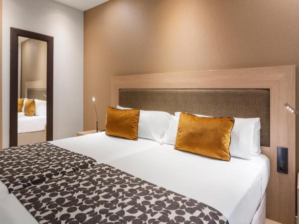 Catalonia Plaza Mayor : photo 4 de la chambre chambre familiale (2 adultes et 2 enfants)