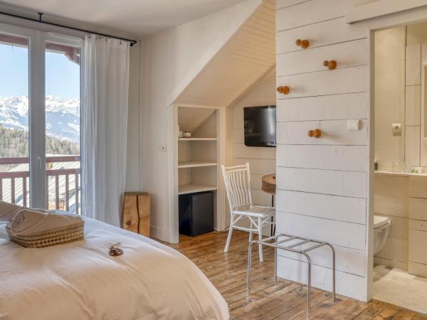 La Féline Blanche : photo 2 de la chambre chambre double supérieure