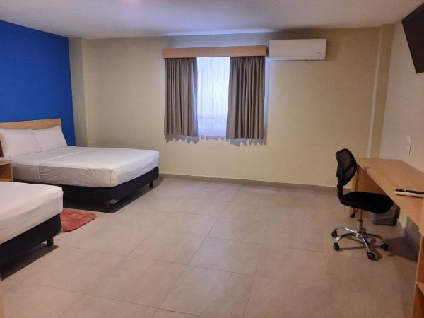 CHN Hotel Monterrey Santa Fe : photo 1 de la chambre chambre deluxe double ou lits jumeaux